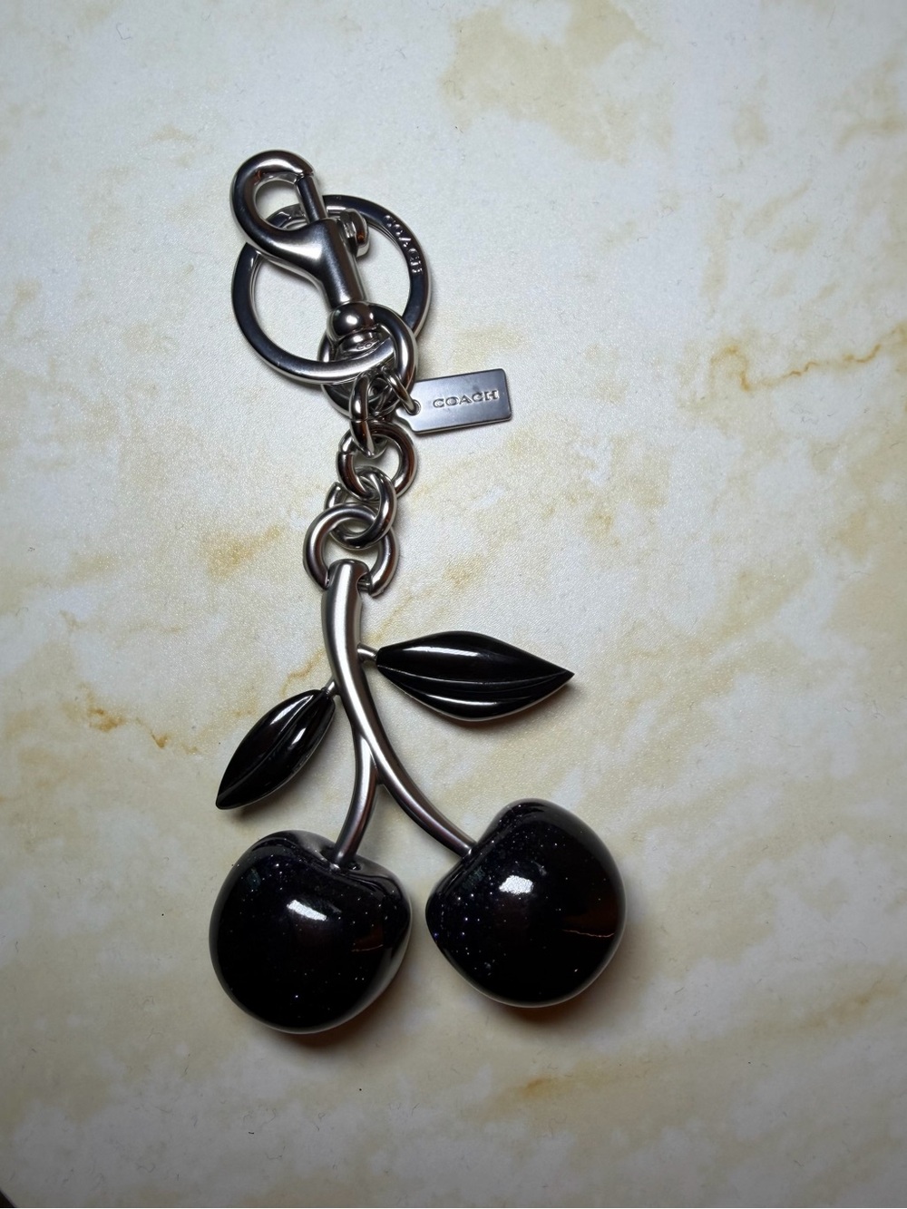 LIKE NEW Coach Black Cherry Enamel Key Charm